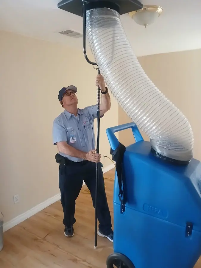 Mini Split Installation technician using HEPA equipment in Johns Creek
